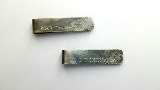 Two oxidised silver handmade money ciips in the Hero jewellery collection design - Christine Sadler