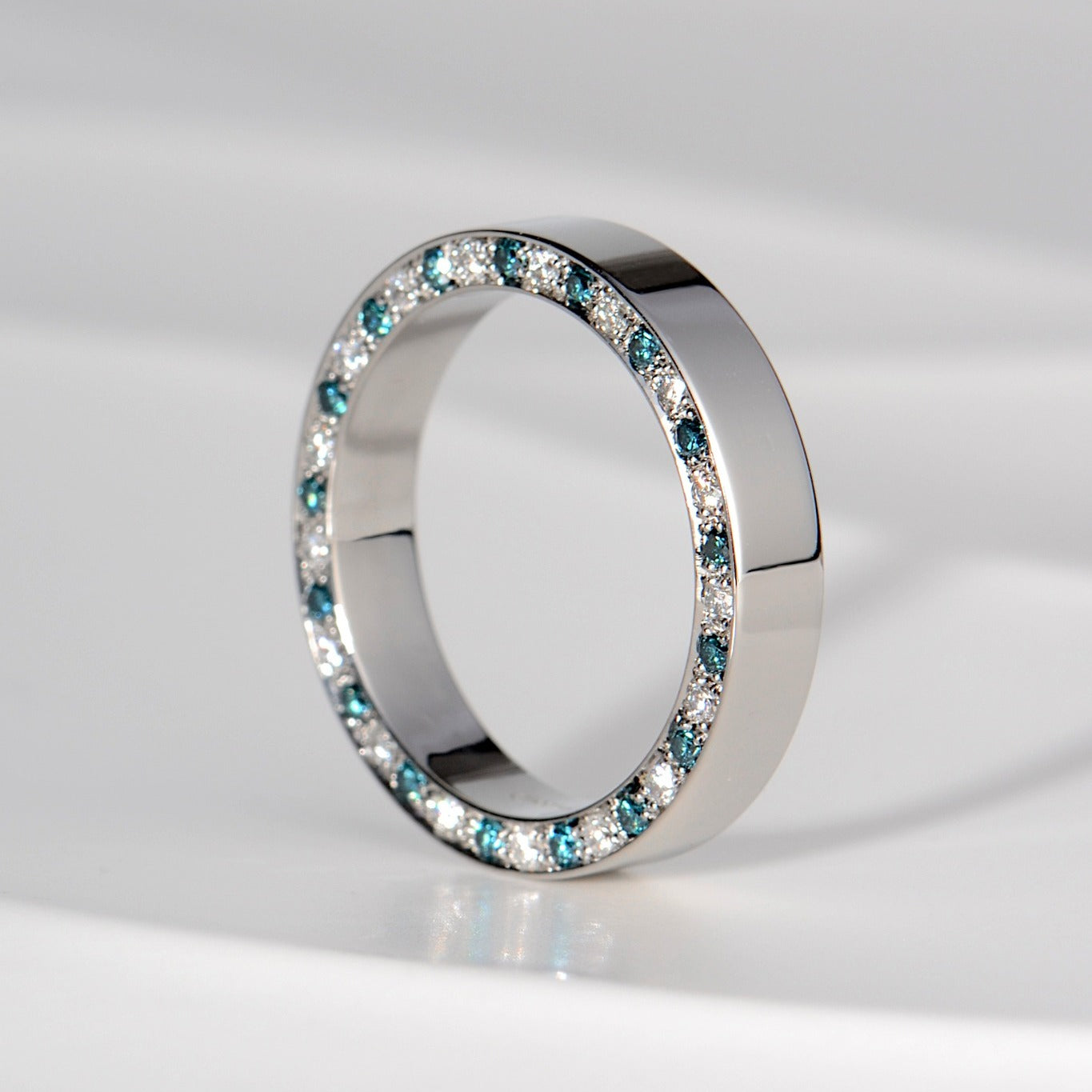 Bespoke Blue and White Diamond Lovelight Ring: A Custom Commission Story