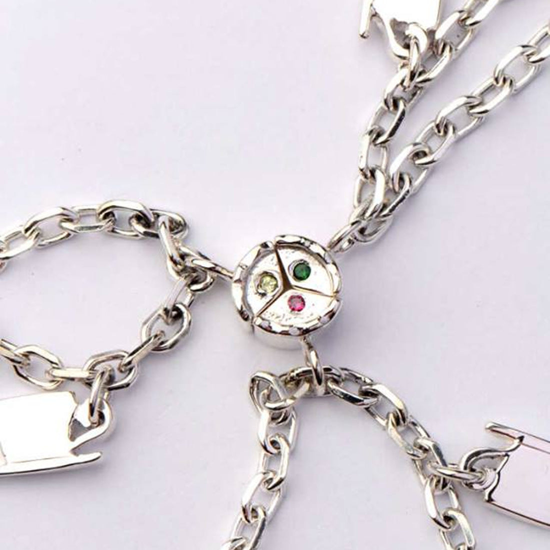 Three necklaces that tell a story of two sisters and their mum