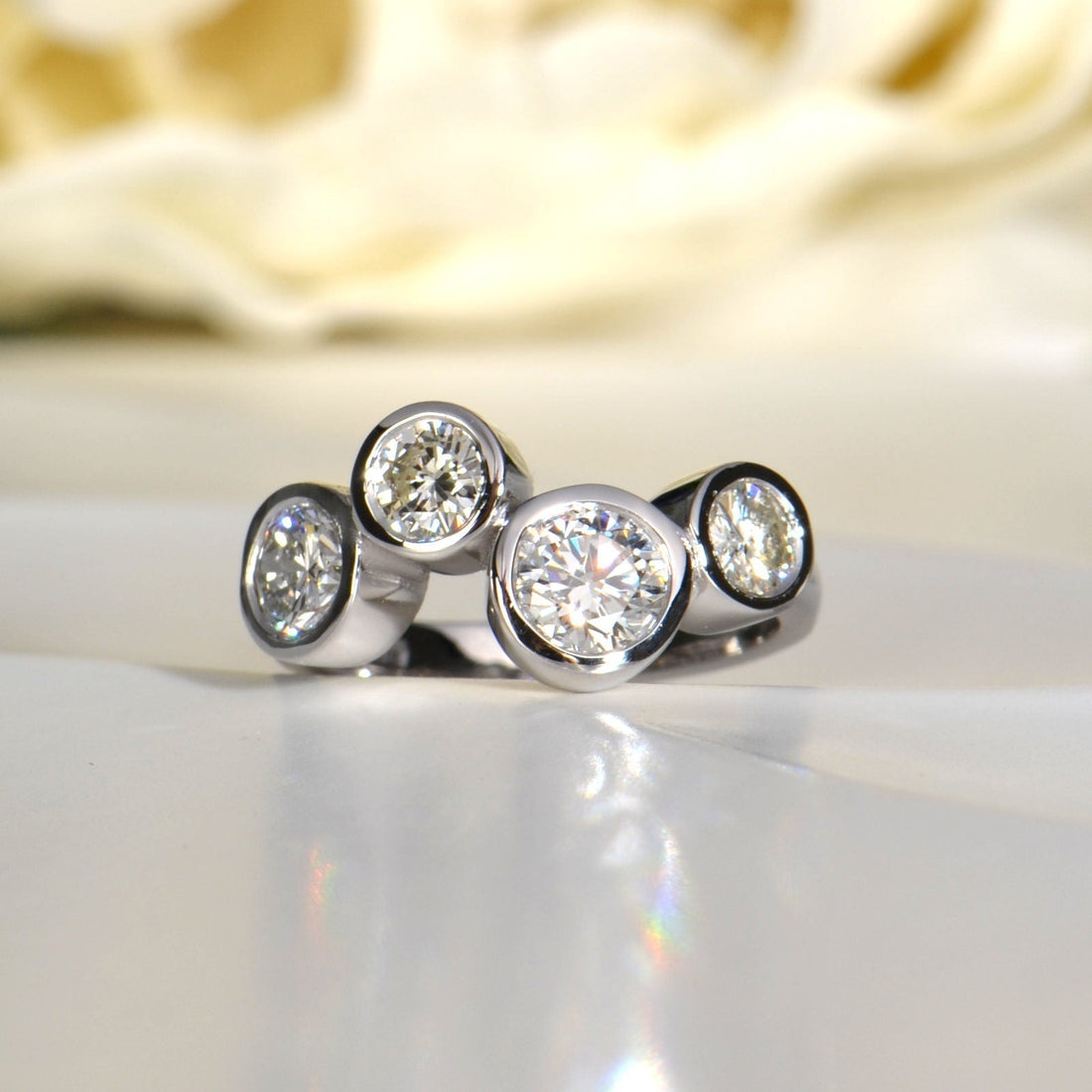 Four stone diamond and lab diamond ring remodelled from an old gold sapphire and diamond ring - Christine Sadler