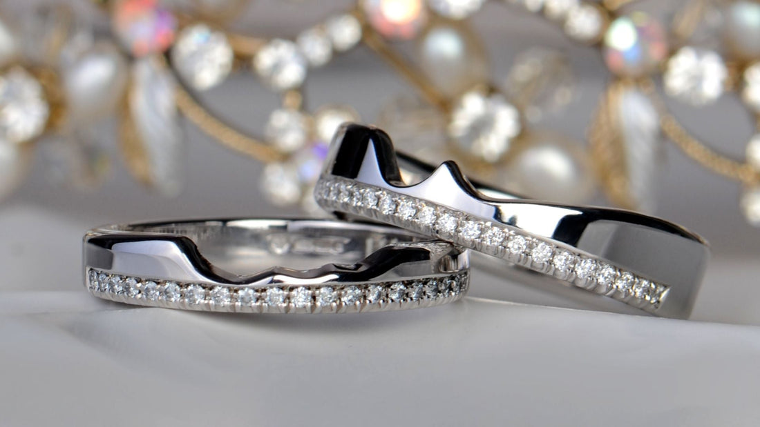 Bespoke shaped wedding ring custom fitted around an engagement ring, designed in Ayr Scotland