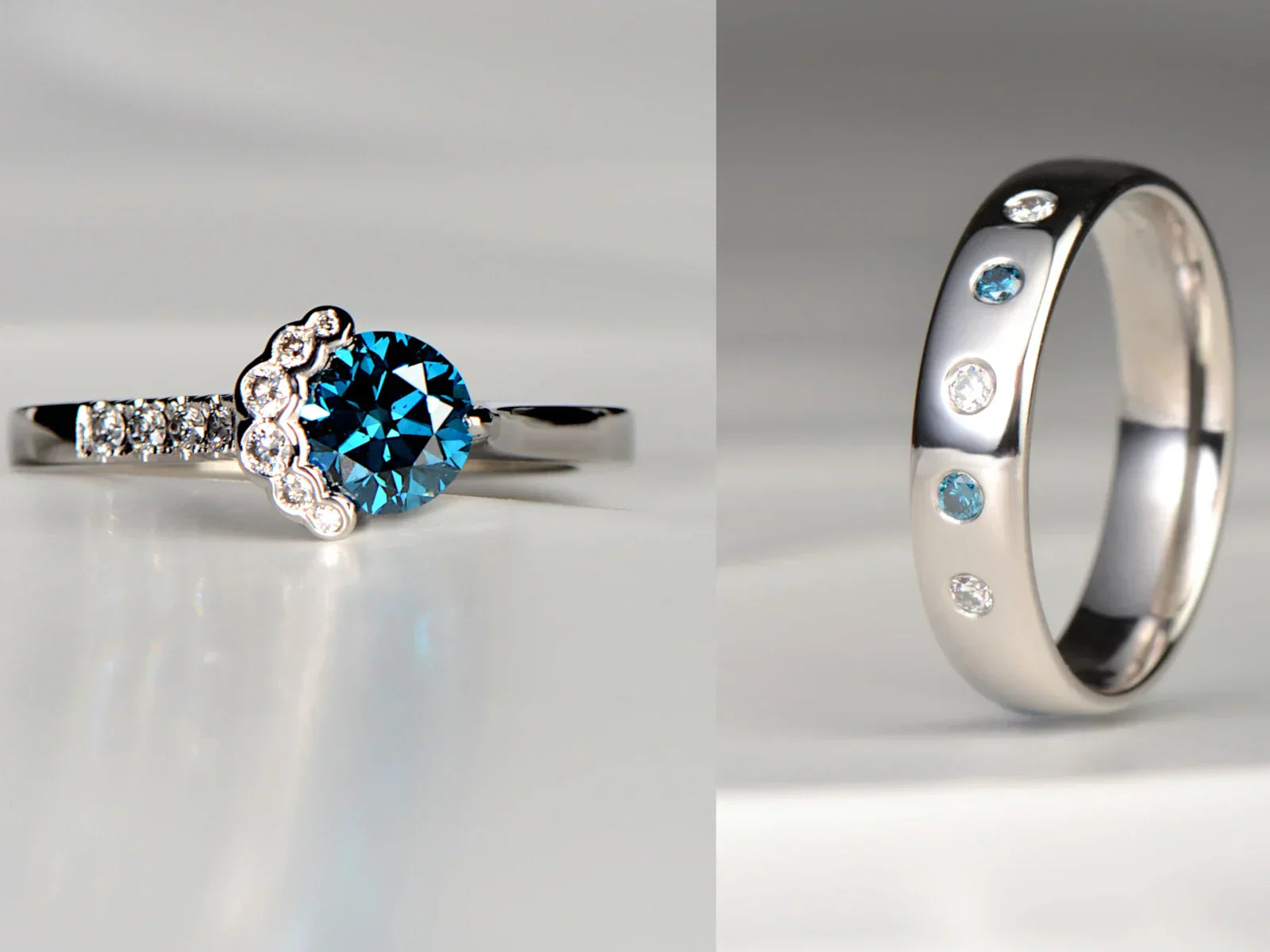 matching engagement rings for a man and a women with blue and white diamonds from Christine Sadler