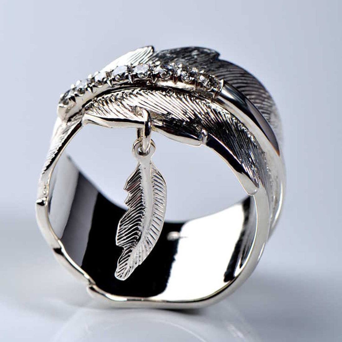 Charming handmade feather ring