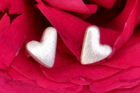 modern handmade silver heart studs from jewellery designer Christine Sadler