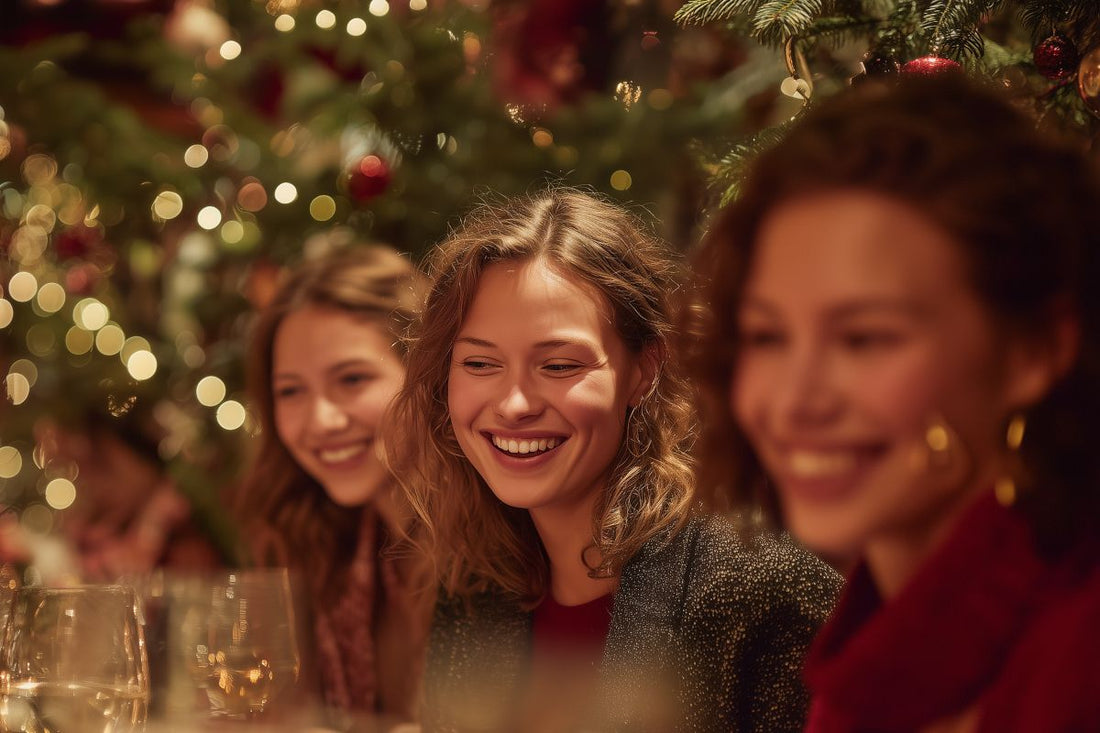 three female friends at Christmas in candel lit bar