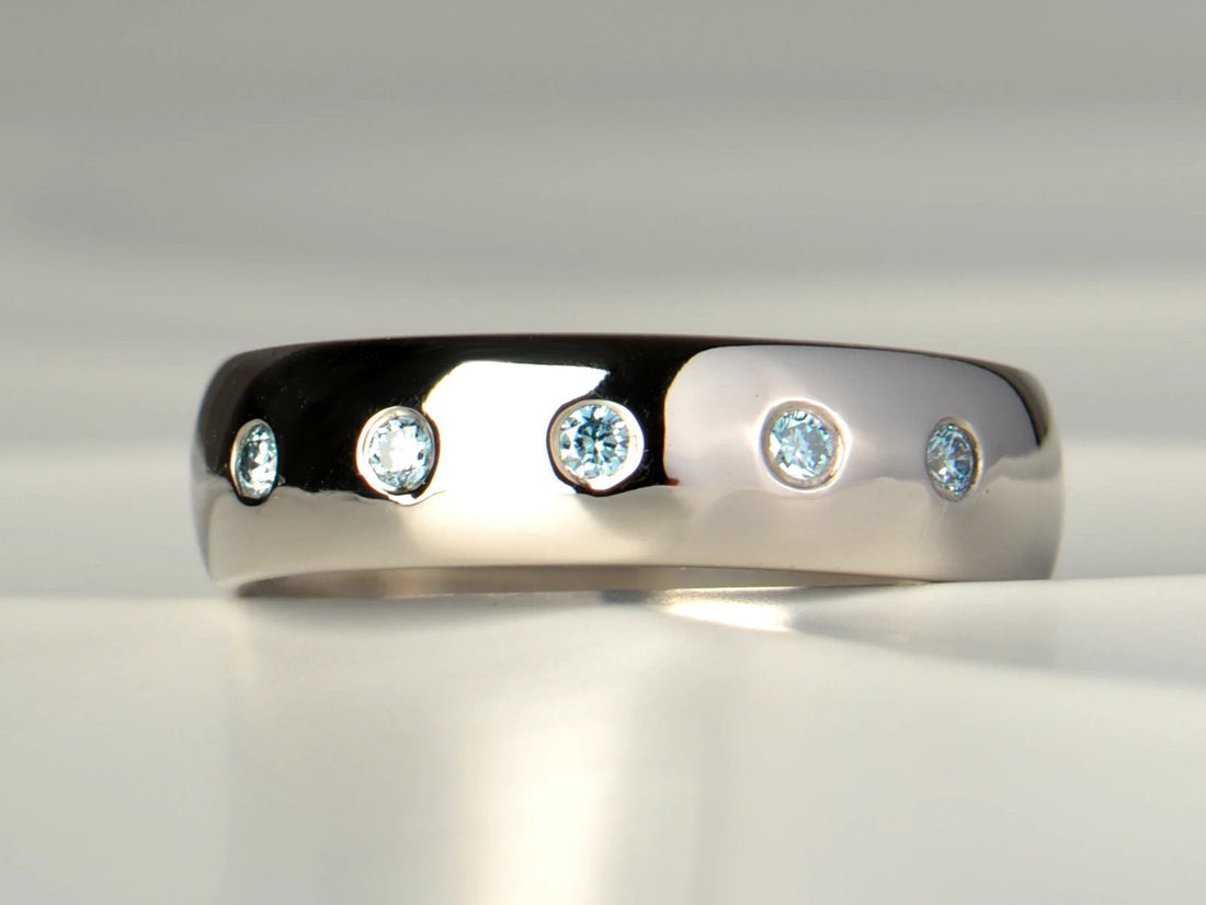 Palladium wedding ring with five round blue diamonds - christine sadler