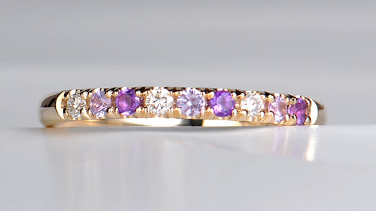 diamond, amethyst and pink sapphire yellow gold eternity ring handmade for a woman's first Mother's Day with her birthstone and her daughter's birthstone in it