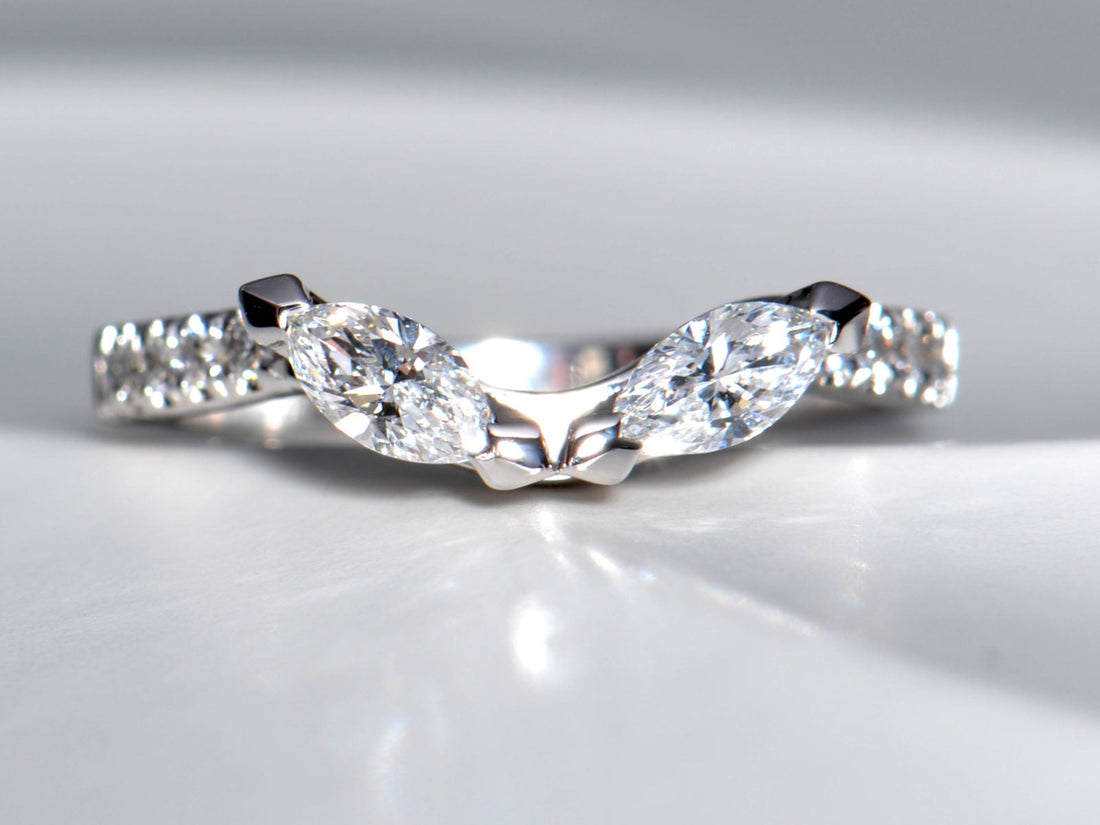 Top-down view of a philosophy ring where two marquise diamonds form the shape of owl eyes, symbolising wisdom - Christine Sadler