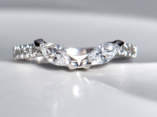 Top-down view of a philosophy ring where two marquise diamonds form the shape of owl eyes, symbolising wisdom - Christine Sadler