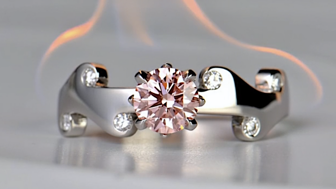 unique platinum and diamond ring set with a pink lab diamond in Christine Sadler's copyrighted Fire design