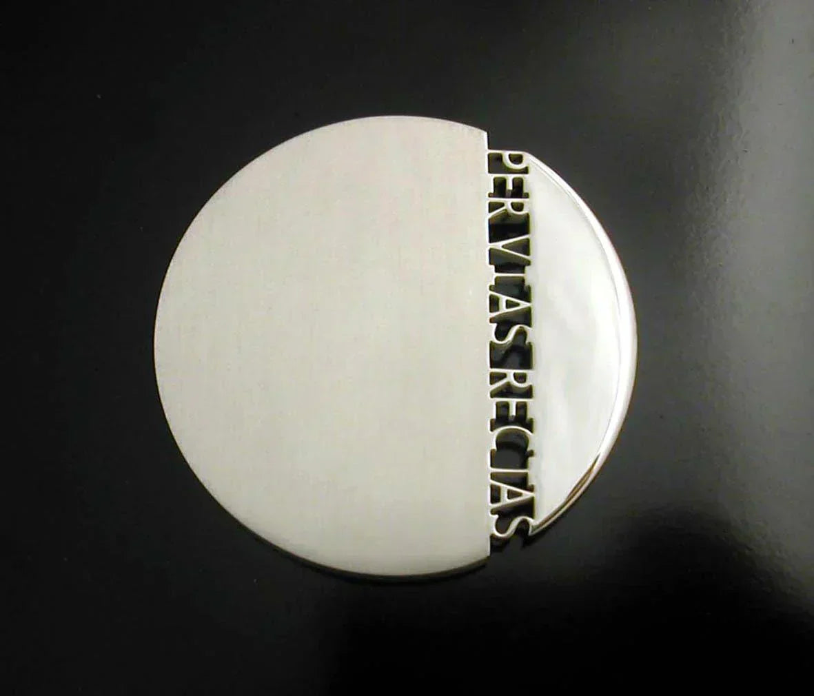 A bespoke solid silver circular Dux medal designed by Christine Sadler.