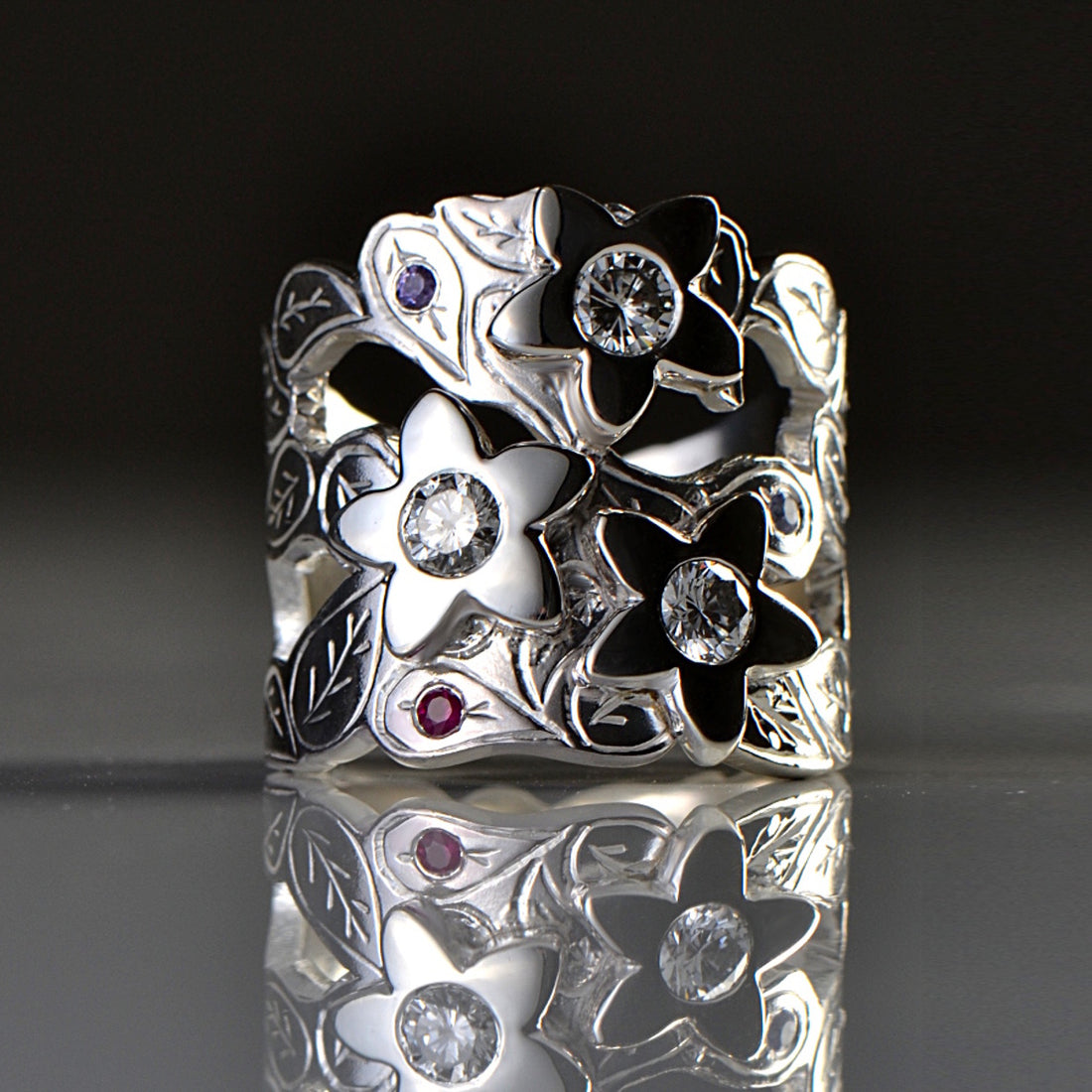 Leaf and flower commission ring with diamonds.