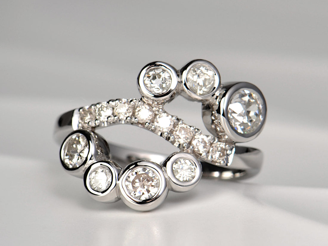Platinum Swim Ring with diamonds, inspired by a customer’s love of swimming and family memories