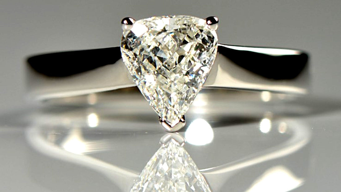 unique platinum engagement ring with a briolette diamond cut into the shape of an arrow head - Christine Sadler