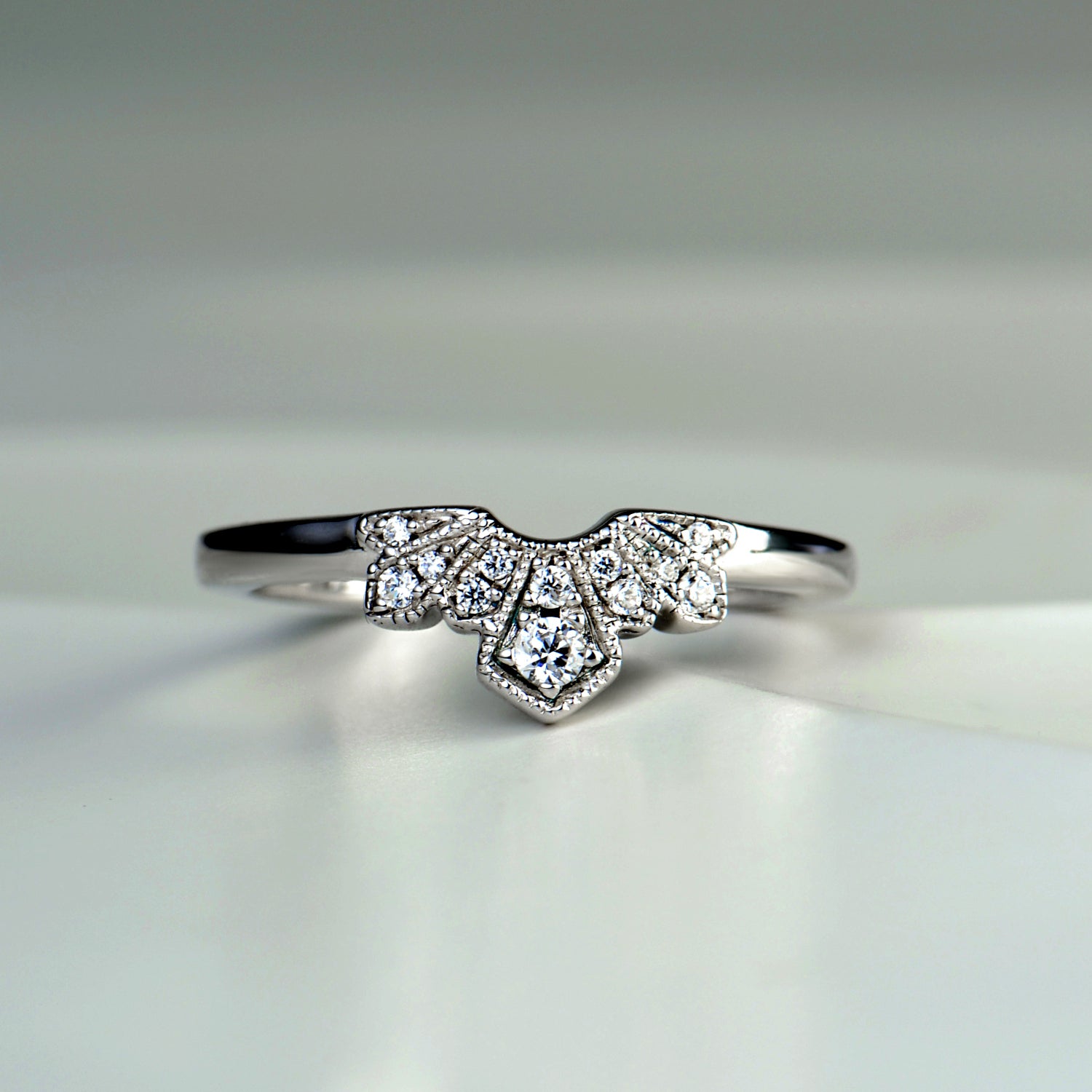 U shaped or V shaped diamond set wedding rings handmade in the UK