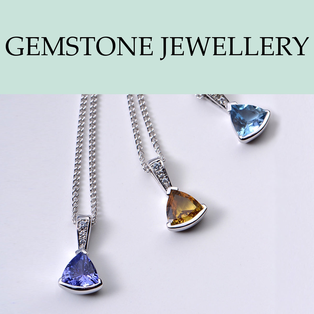 Designer gemstone fine jewellery in gold, platinum and silver
