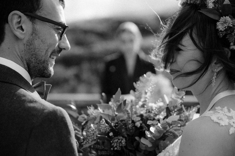 Bride wearing handmade drop star earrings made for her wedding day 