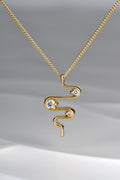 close up of 18ct yellow gold heartbeat three stone diamond designer pendant on 45cm chain