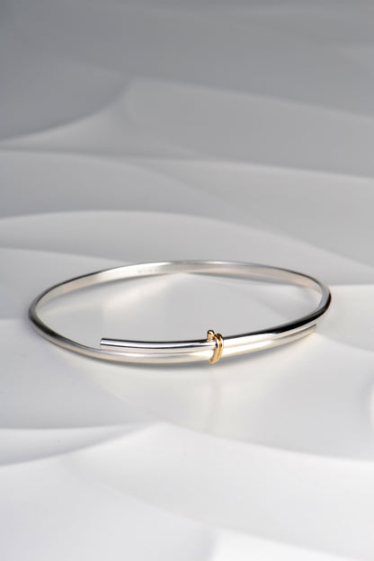 modern silver silver and gold designer handmade bangle from UK jewellery designer Christine Sadler