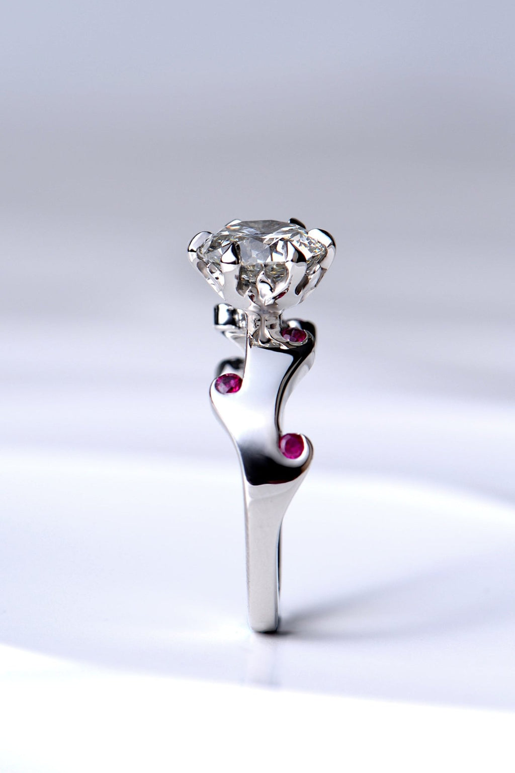 Romantic unforgettable fire designer platinum diamond and ruby ring by jewellery designer Christine Sadler