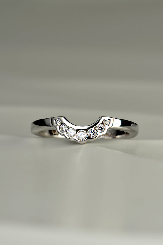 diamond set U shaped wedding ring with modern scalloped edge detail