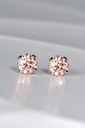 Fancy vivid pink certificated platinum lab diamond earrings. An exclusive design by UK jewellery designer Christine Sadler.