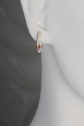designer silver and rose gold modern earrings that symbolise a bond by jewellery designer Christine Sadler, Ayr