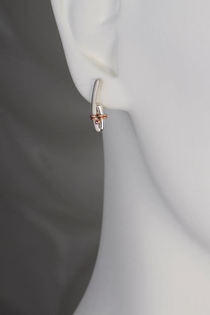 designer silver and rose gold modern earrings that symbolise a bond by jewellery designer Christine Sadler, Ayr