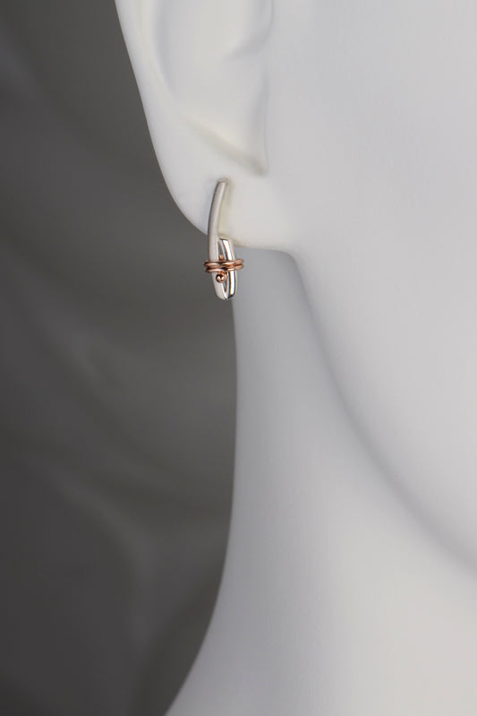 designer silver and rose gold modern earrings that symbolise a bond by jewellery designer Christine Sadler, Ayr