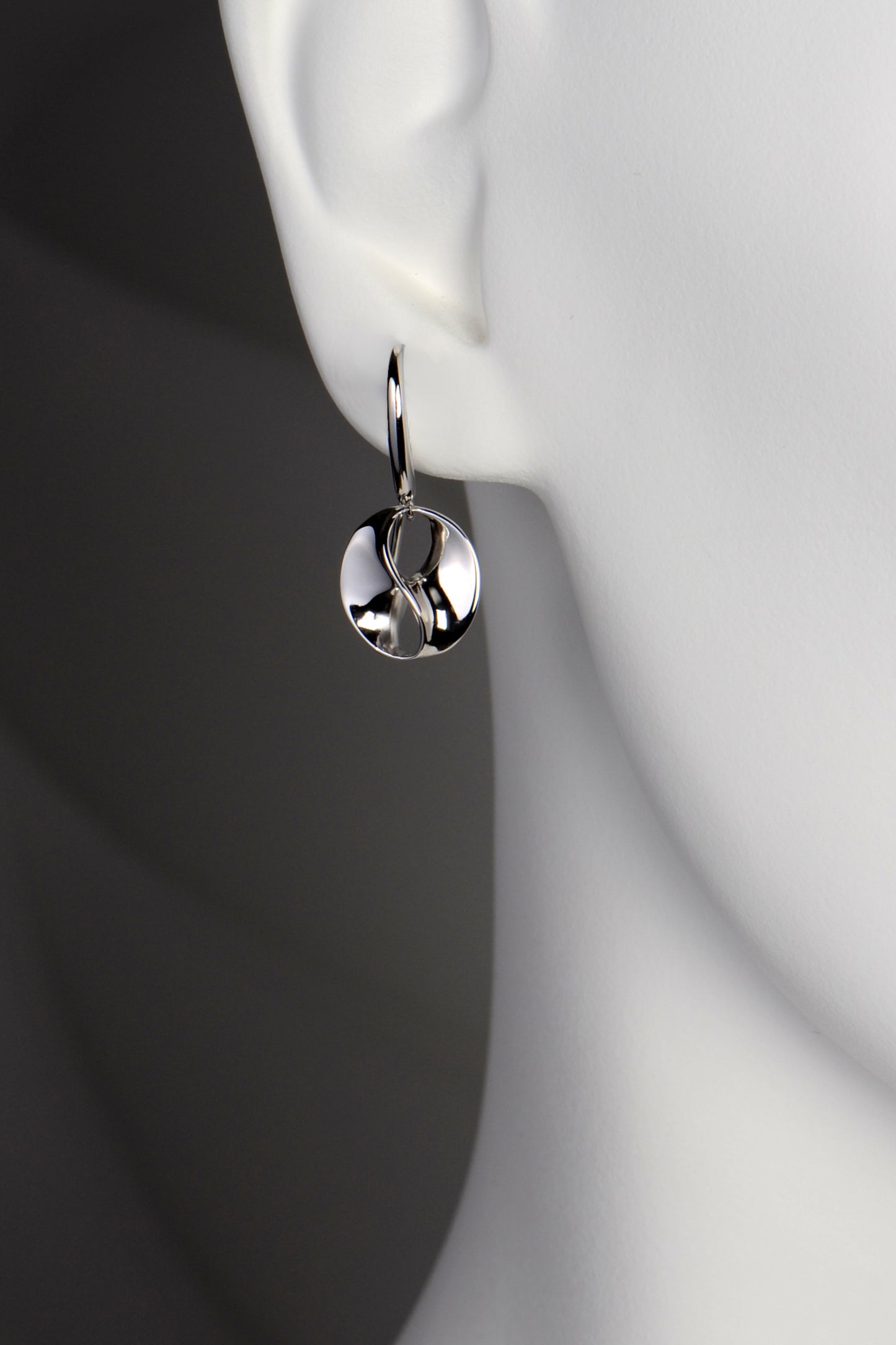 elegant designer earrings round drop from a hook fitting