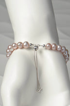 Close up detail of the adjustable silver slider clasp on pale pink cultured pearl bracelet from Christine Sadler