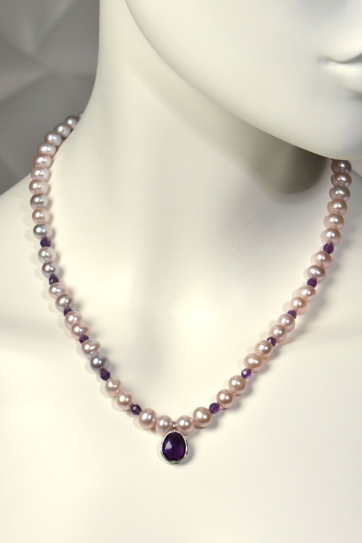 18-inch pink cultured pearl necklace with 12 faceted 4mm amethysts and egg-shaped amethyst pendant in textured sterling silver