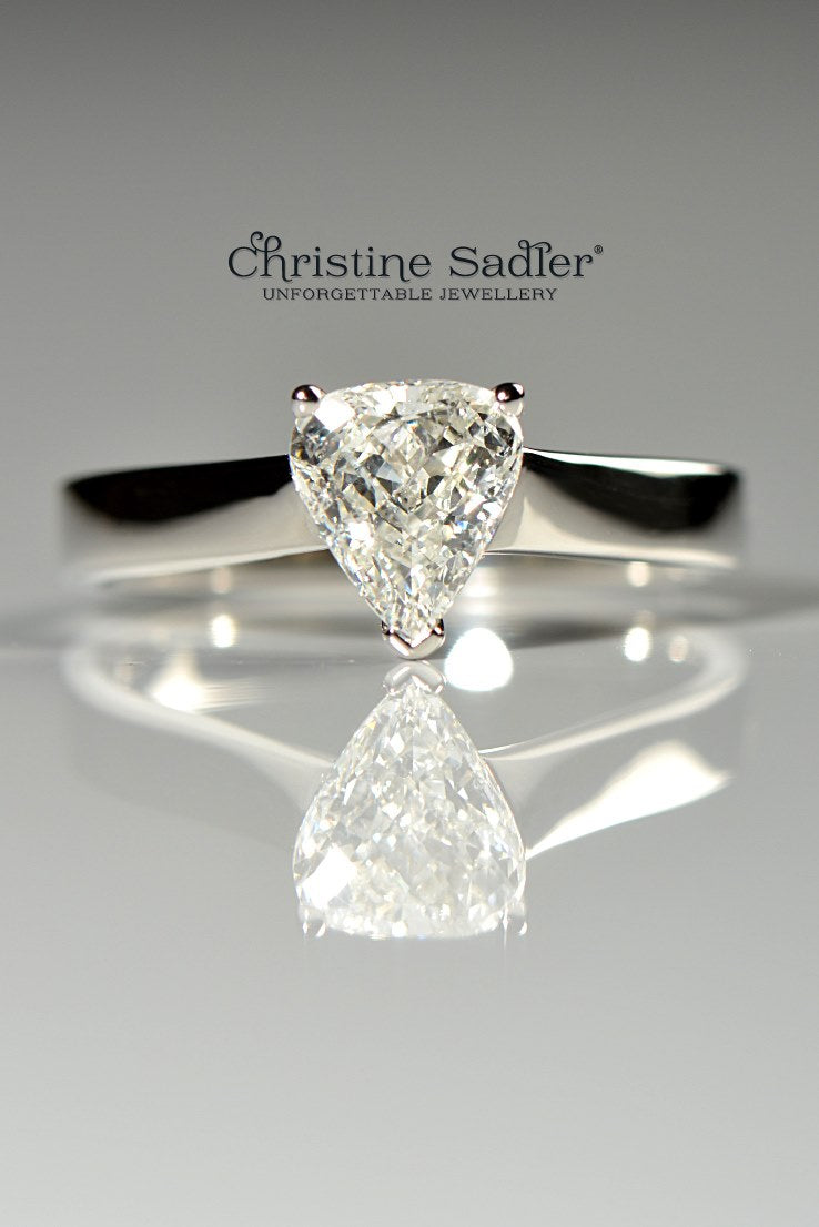 one-of-a-kind-platinum engagement ring set with a briolette cut diamond from Christine Sadler called "arrow" because it looks like the tip of an arrow