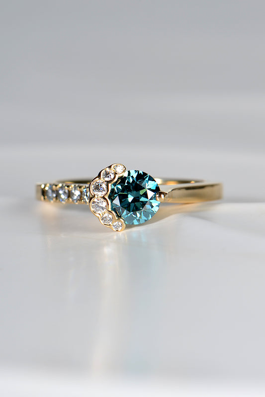 stunning dream blue and white diamond engagement ring inspired by the breathtaking Scottish landscape on the Isle of Skye