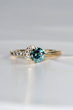 stunning dream blue and white diamond engagement ring inspired by the breathtaking Scottish landscape on the Isle of Skye