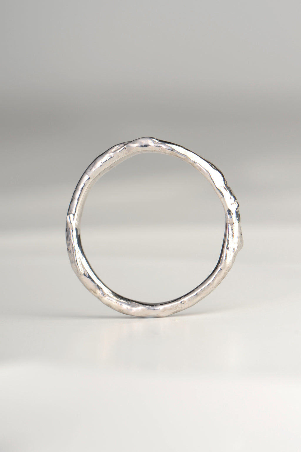 a real silver designer ring that looks like it is made from a branch or twig by jewellery designer Jorge Revilla