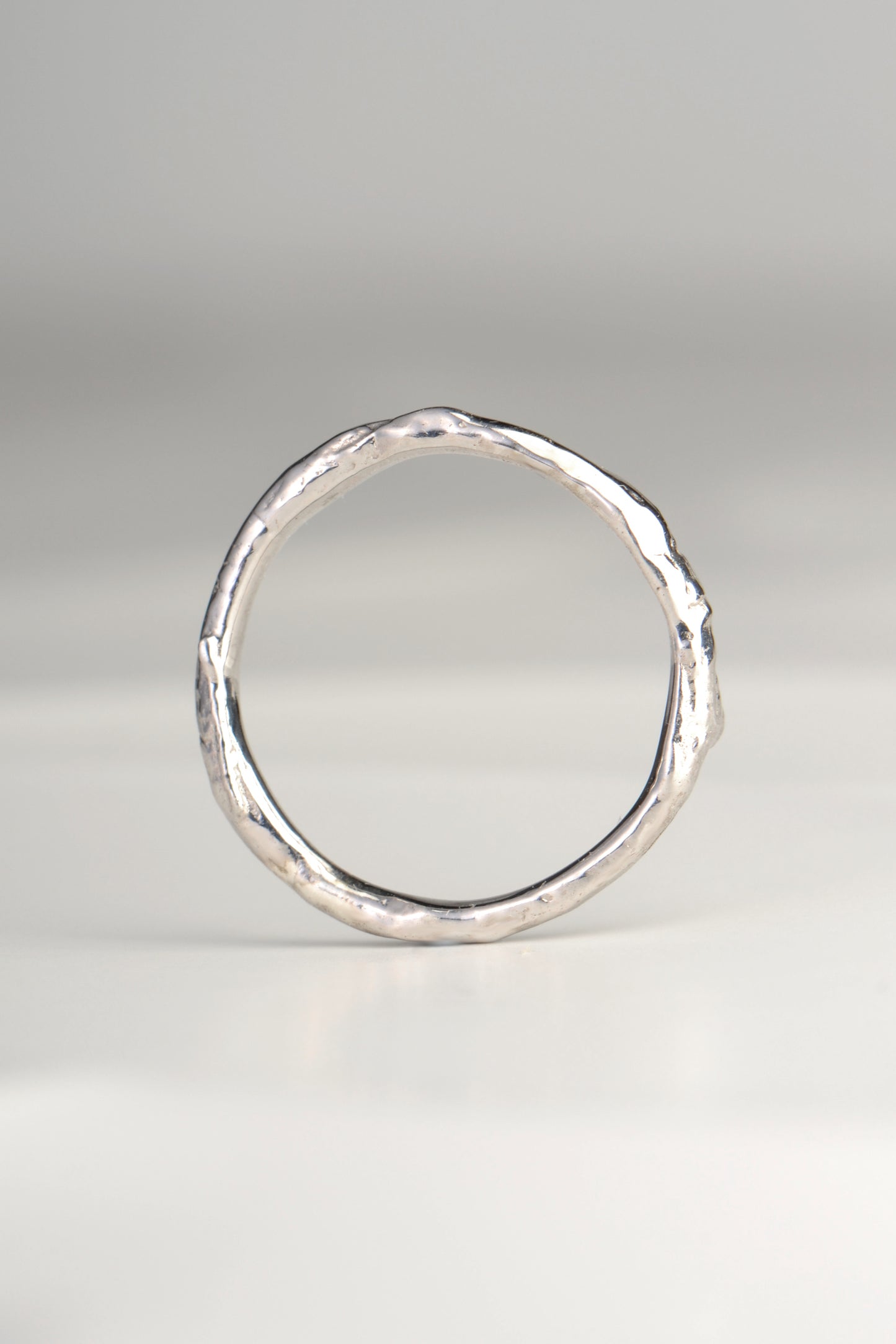 a real silver designer ring that looks like it is made from a branch or twig by jewellery designer Jorge Revilla