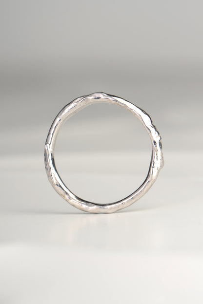 a real silver designer ring that looks like it is made from a branch or twig by jewellery designer Jorge Revilla