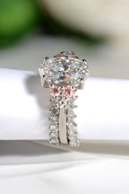 Two diamond guard rings, one on either side of the Rosé Spark lab diamond engagement ring - Christine Sadler