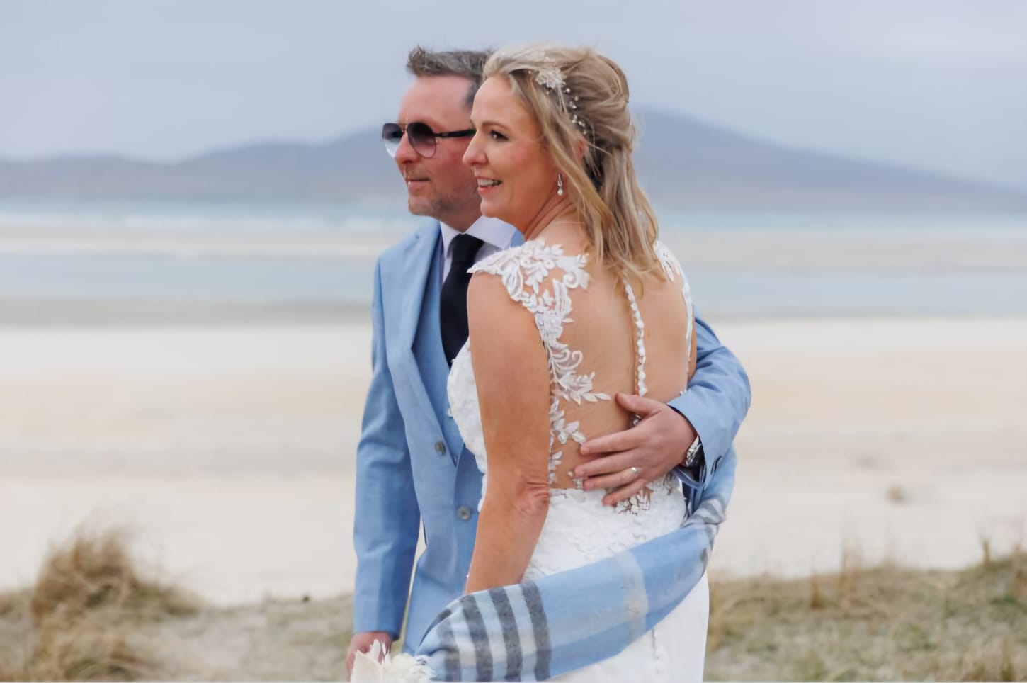Bride and groom wearing new wedding ringson beach in Troon, Scotland - Christine Sadler