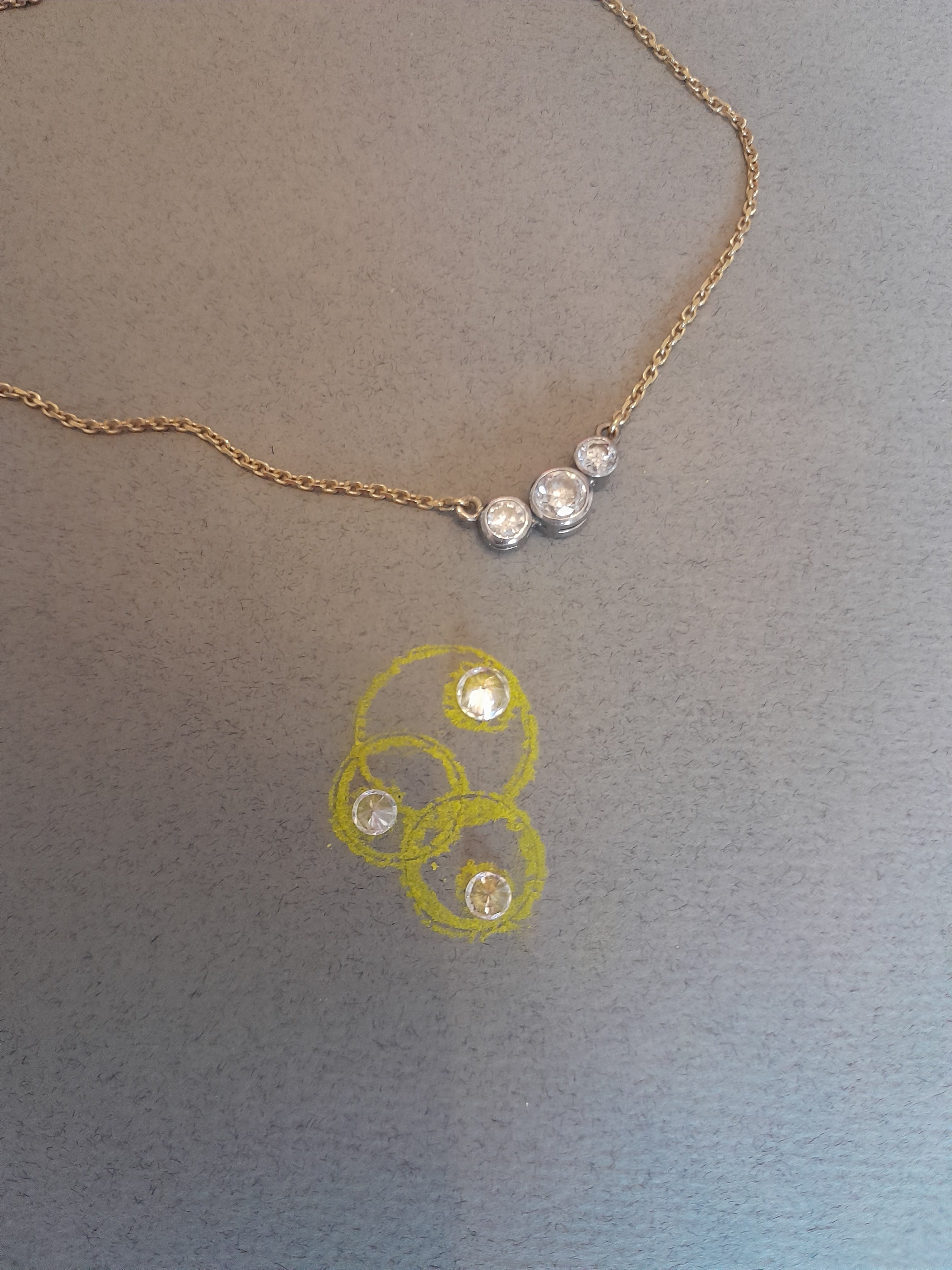Three-stone antique necklace redesigned into modern interlocked gold circle pendant — heirloom jewellery remodelling by Christine Sadler