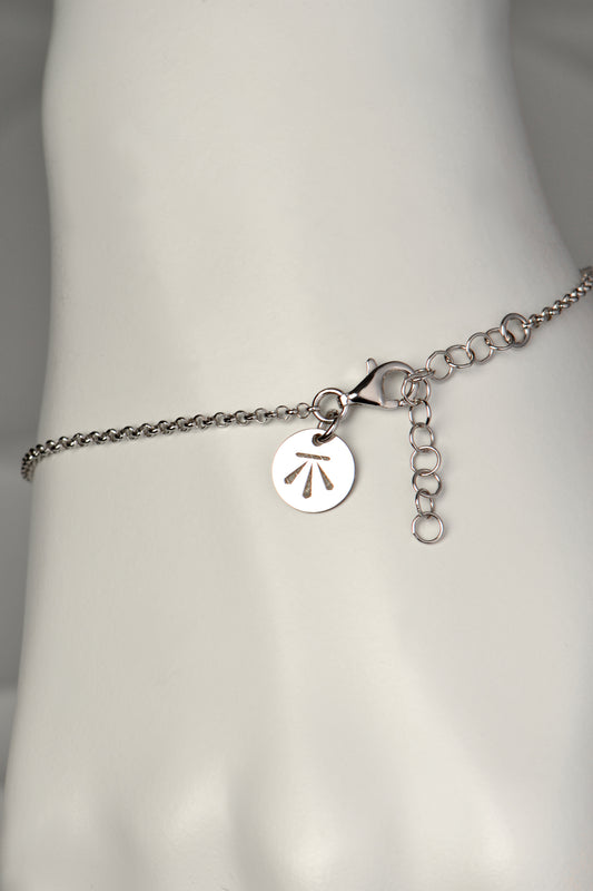 delicate silver talisman bracelet that is adjustable in length from contemporary jewellery designer Christine Sadler