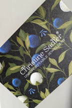 Christine Sadler luxury jewellery gift voucher with unique thistle and white rose design.