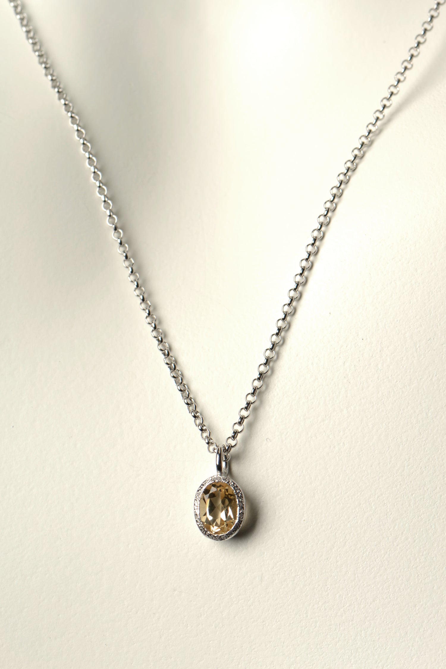 Designer silver gemstone necklace with an oval Citrine, the birthstone for November