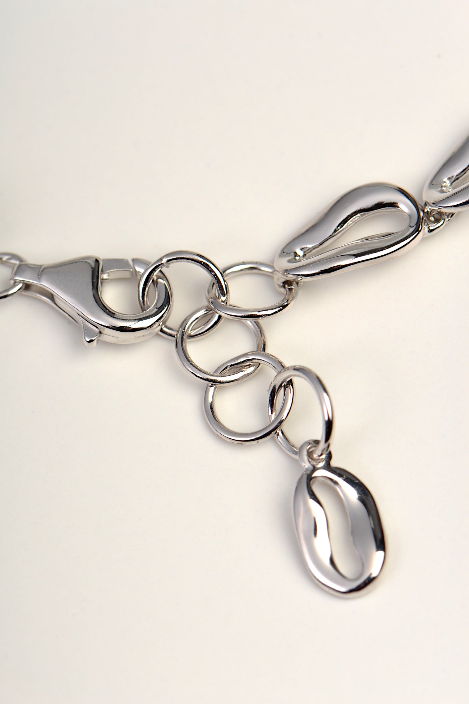 detail of the clasp on a designer silver coffee bean bracelet