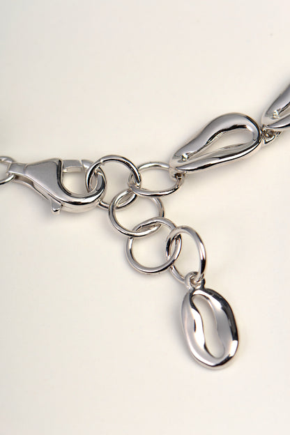 detail of the clasp on a designer silver coffee bean bracelet
