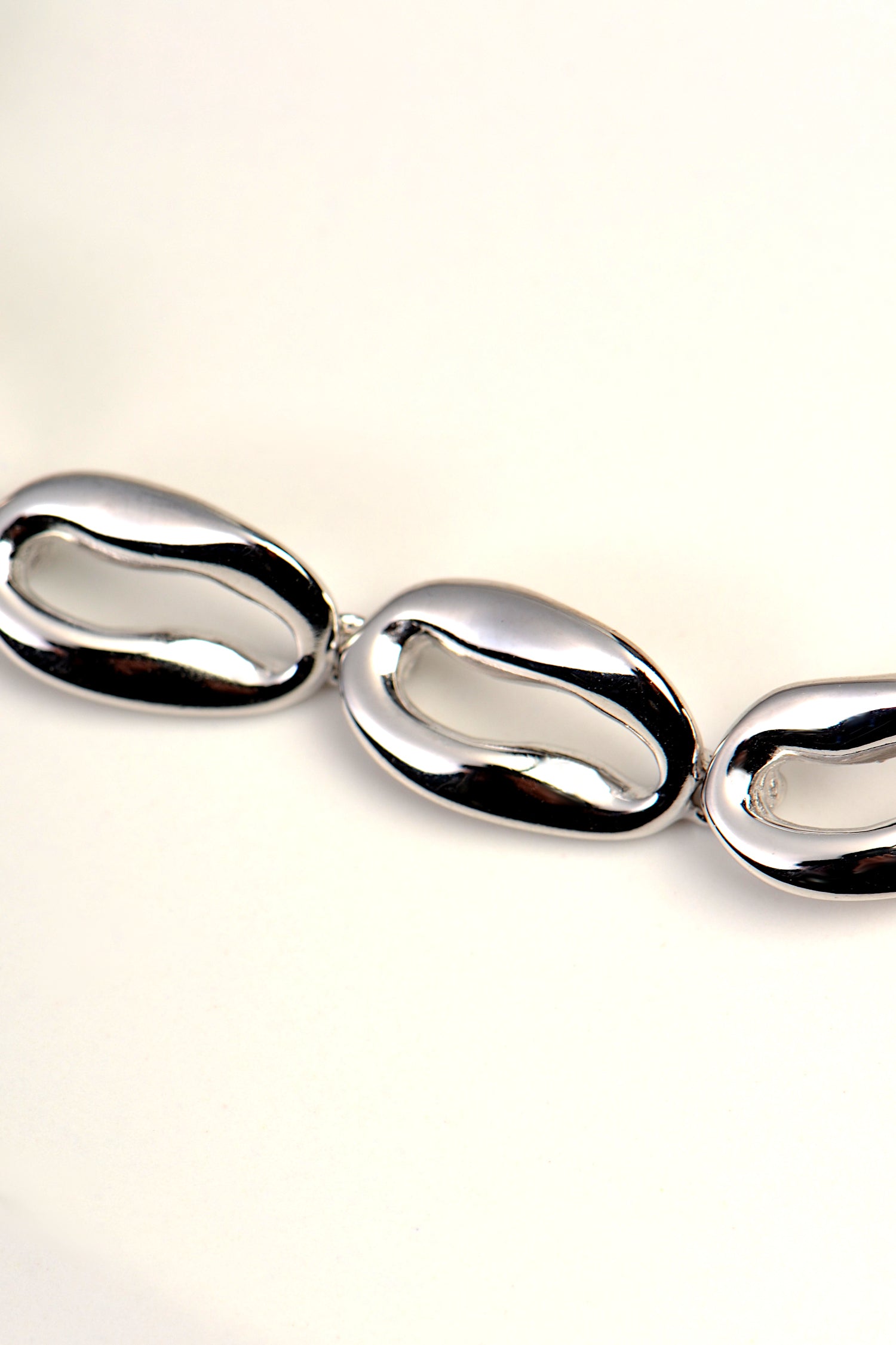 coffee bean shaped designer silver bracelet for women by Jorge Revilla