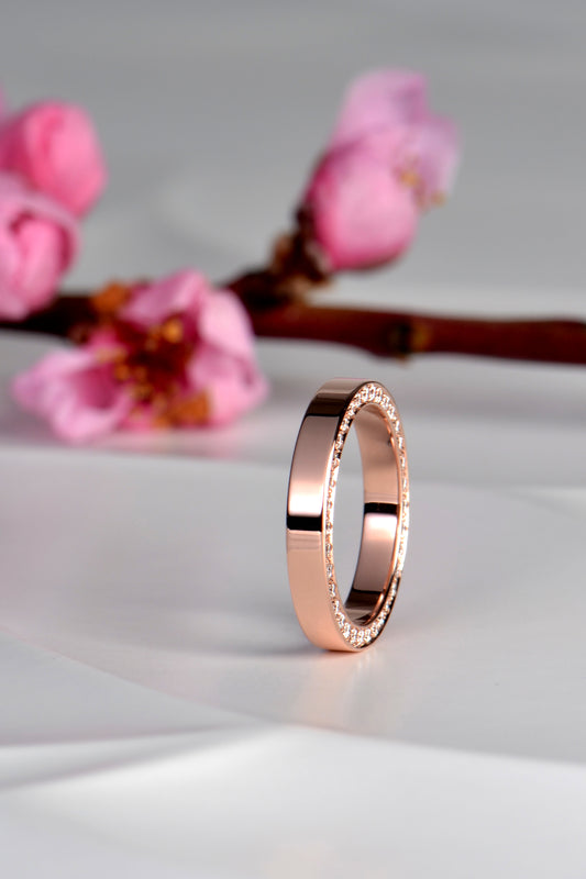 modern designer diamond set rose gold wedding ring made in the UK