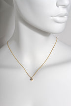 handmade 9ct yellow gold round pendant set with a 0.10ct lab diamond on a 16 inch curb necklace - Christine Sadler