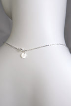 detail of the back of the necklace showing the clasp and branded silver tag of Christine Sadler Unforgettable Jewellery